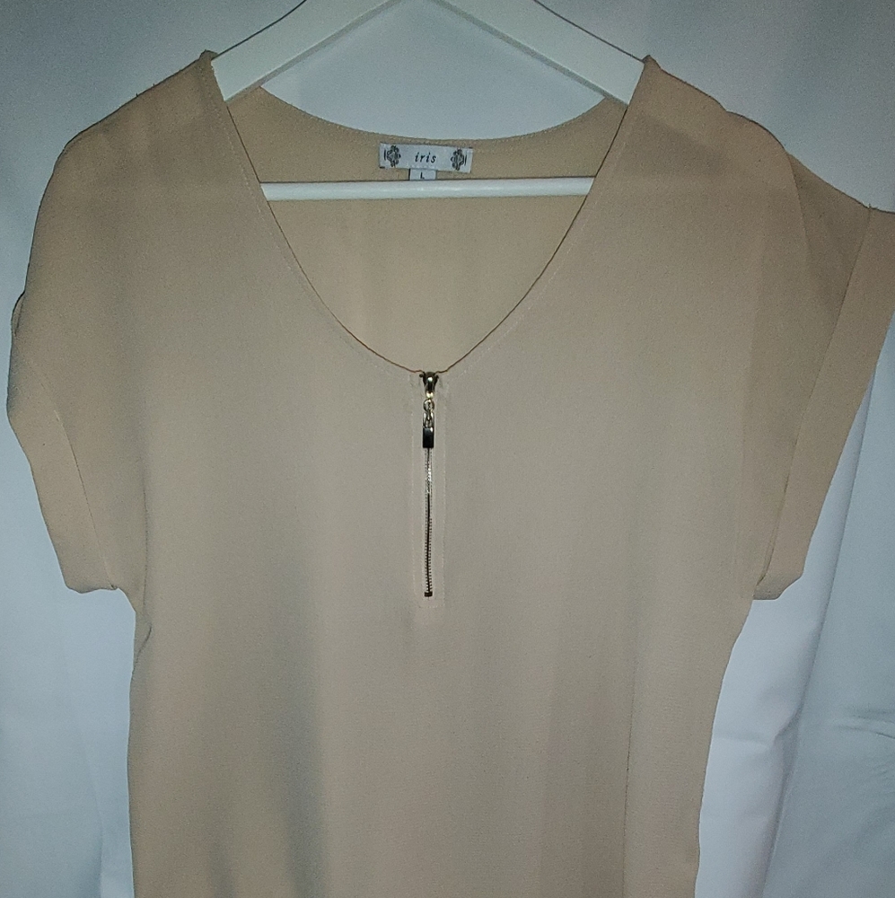 Blouse in size Large. Khaki in color. Gold zipper and folded sleeves.